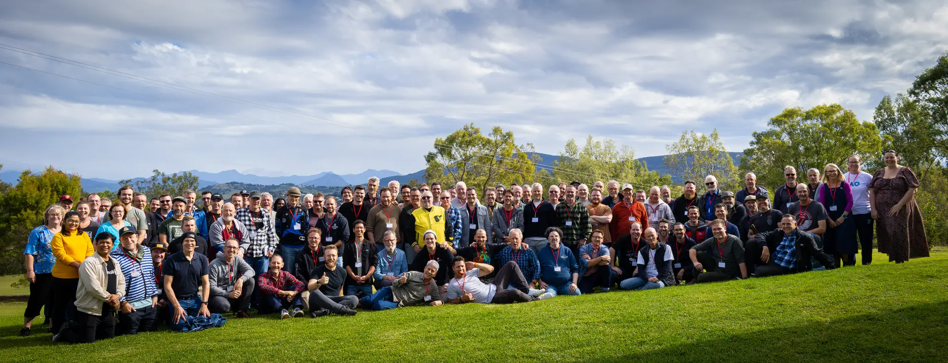 CFMF community group photo at an outdoor gathering